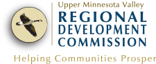 UMVRDC Logo. A good flying in a beige circle. Blue and tan font that reads: Upper Minnesota Valley Regional Development Commission.